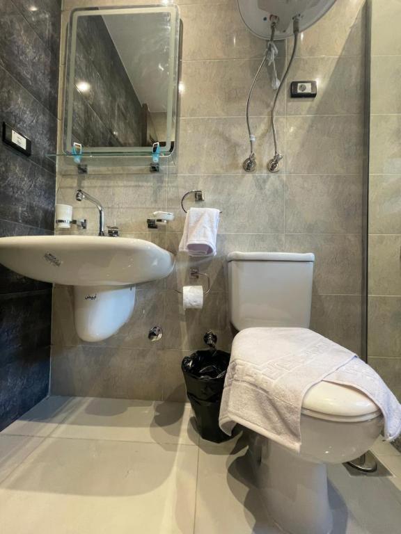 Unique Pyramids Boutique Inn Kafret el-Gabal Extérieur photo