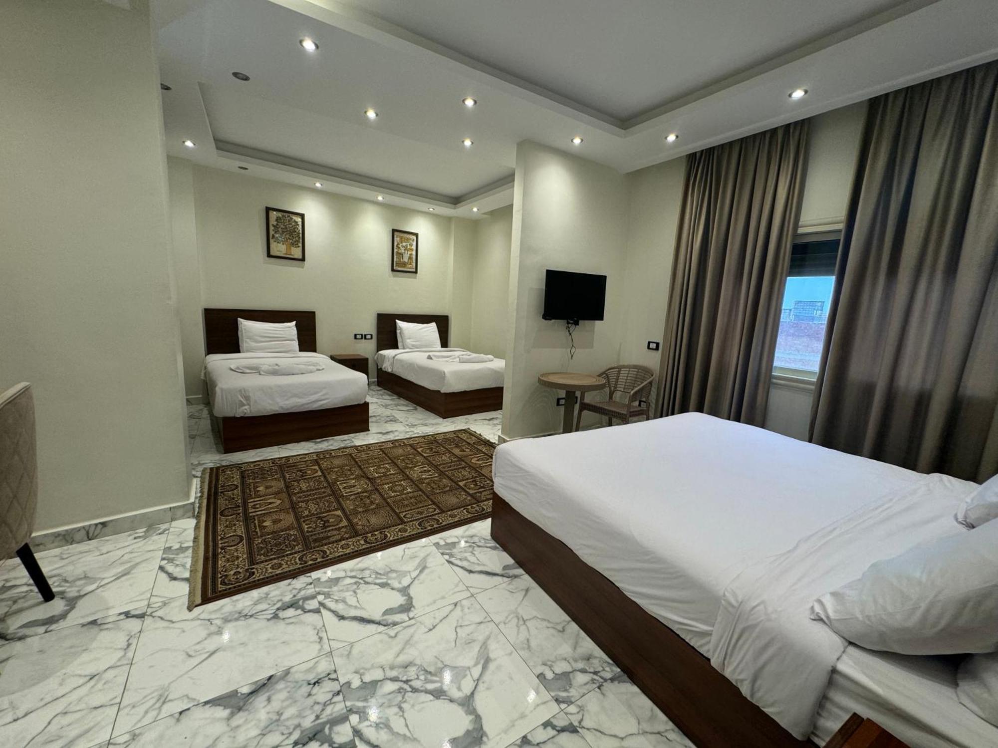 Unique Pyramids Boutique Inn Kafret el-Gabal Extérieur photo