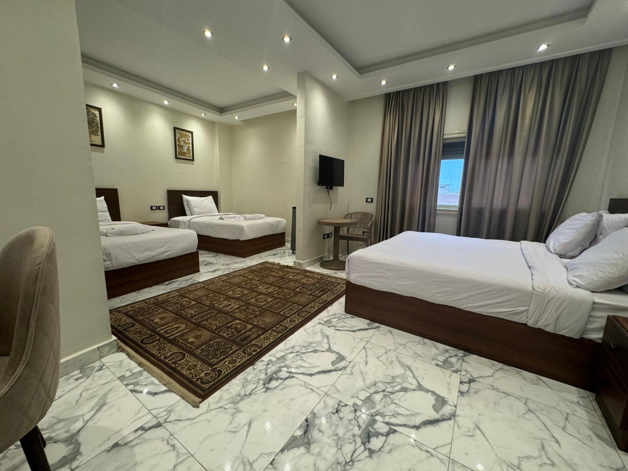 Unique Pyramids Boutique Inn Kafret el-Gabal Extérieur photo