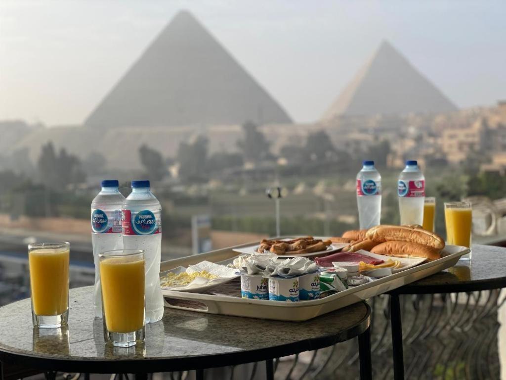 Unique Pyramids Boutique Inn Kafret el-Gabal Extérieur photo