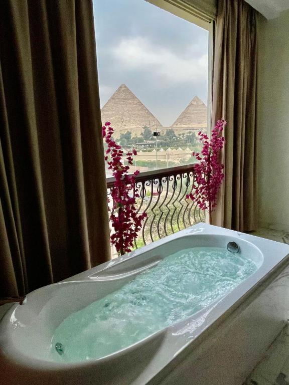 Unique Pyramids Boutique Inn Kafret el-Gabal Extérieur photo