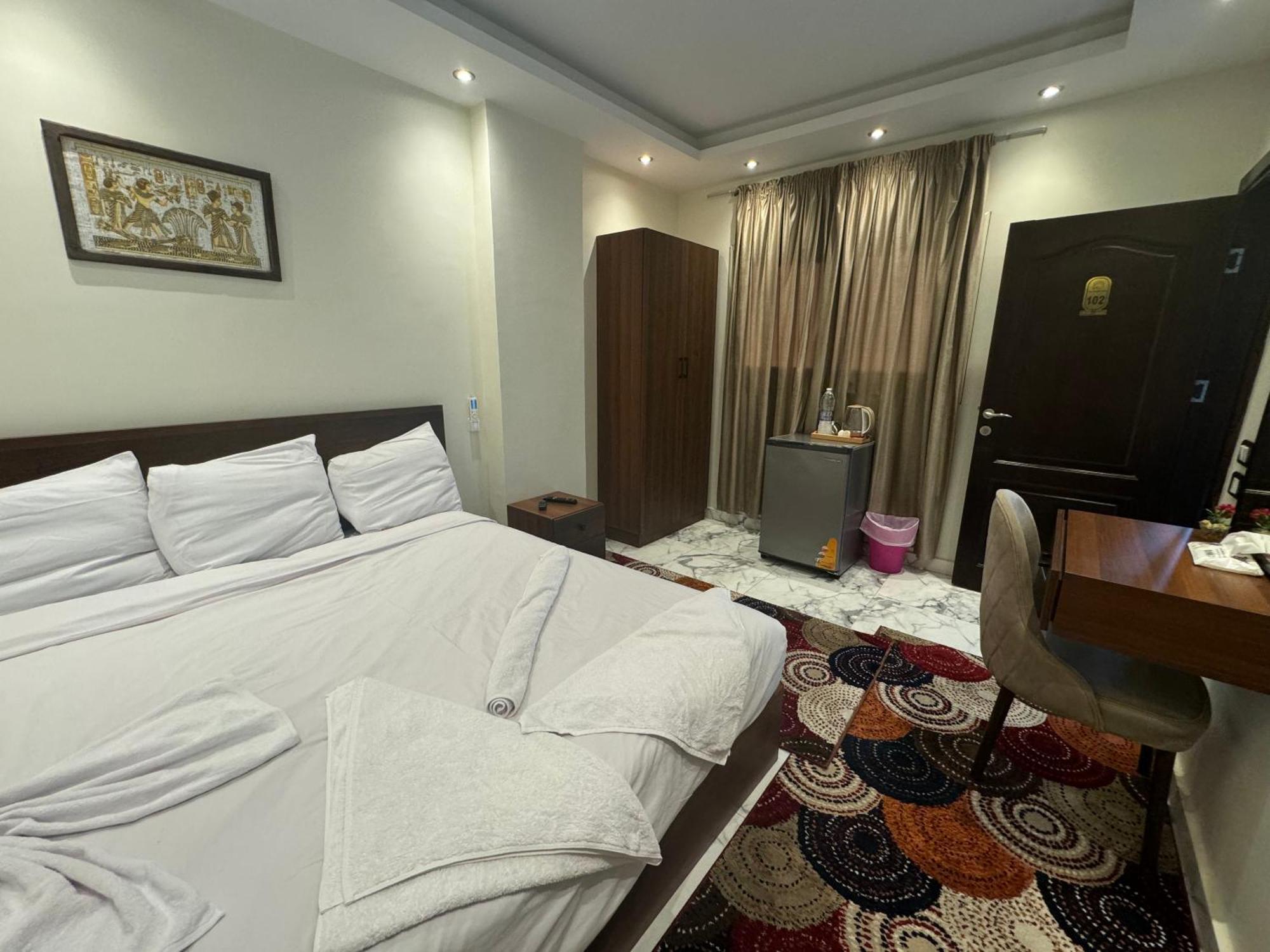 Unique Pyramids Boutique Inn Kafret el-Gabal Extérieur photo