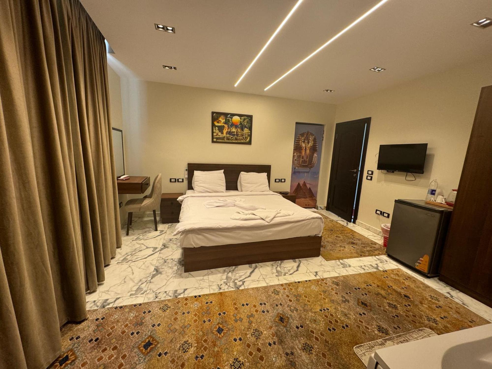 Unique Pyramids Boutique Inn Kafret el-Gabal Extérieur photo
